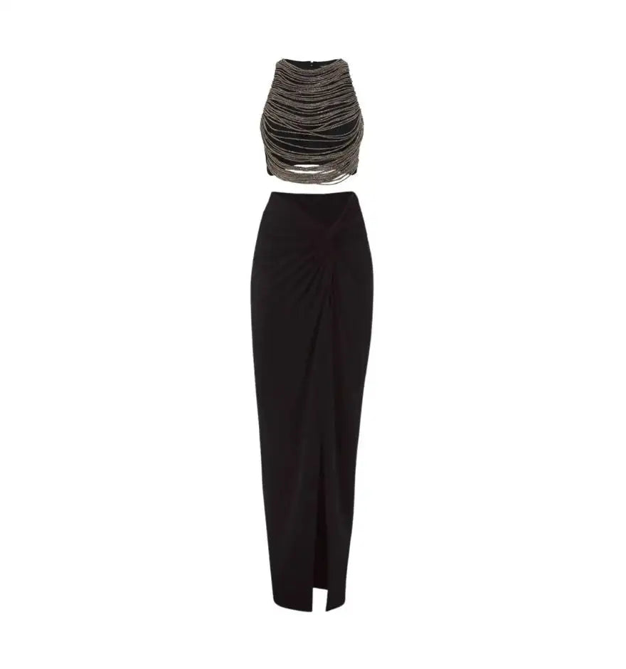 Black satin maxi skirt with a front slit and draped waistband.