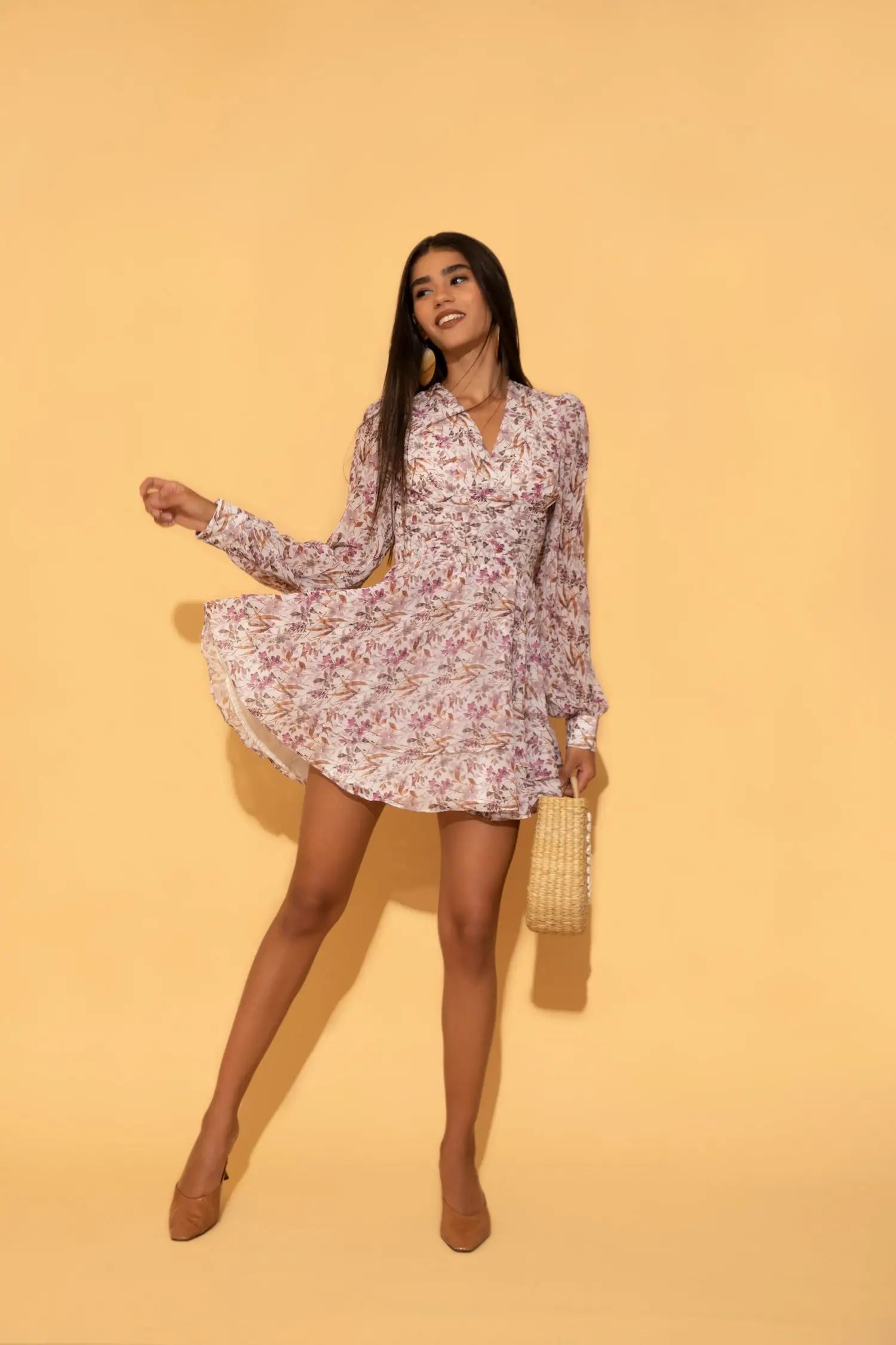 A casual floral printed dress suited for both day and night by Torqadorn