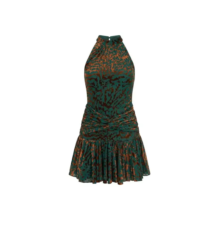 A halter-neck mini dress in a dark green and rust-colored abstract pattern, featuring ruched detailing at the waist and a flared skirt.