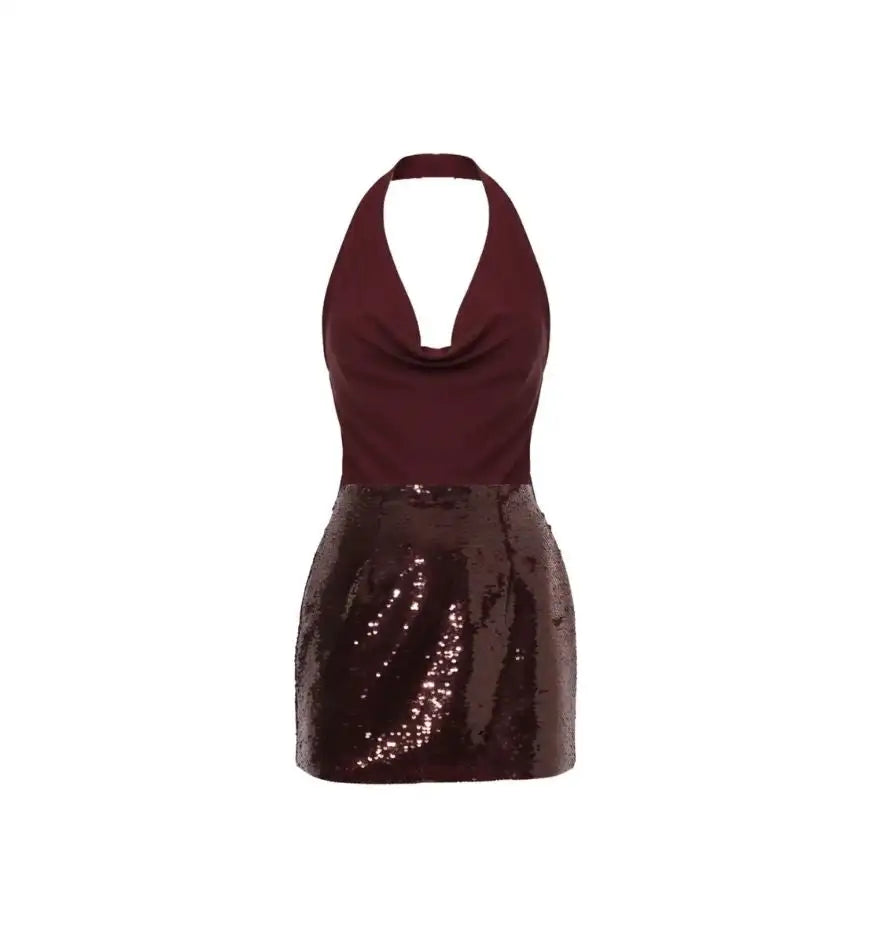 A maroon halter-neck mini dress with a cowl neckline and a sequined skirt.