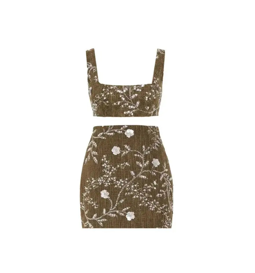 Olive green two-piece set with delicate white floral embroidery and textured fabric