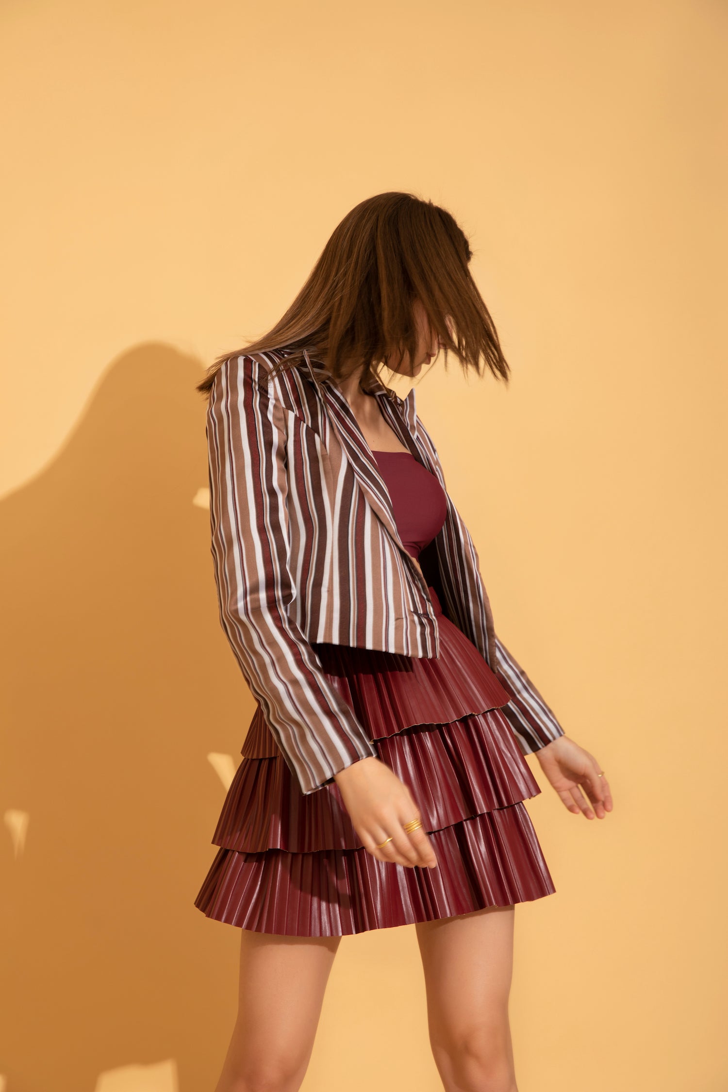 Shop the look from Torqadorn featuring striped crop blazer in stripes  and wine pleated faux leather skirt