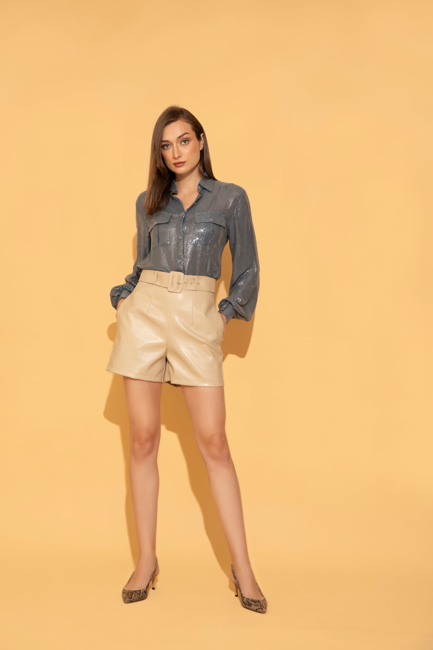 Pine Blue Sequins Shirt styled with Cream Faux Leather Shorts from Torqadorn